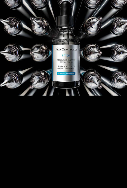 Flacon de serum SkinCeuticals C E Ferulic sur fond sombre, avec un logo indiquant "20 Ans".