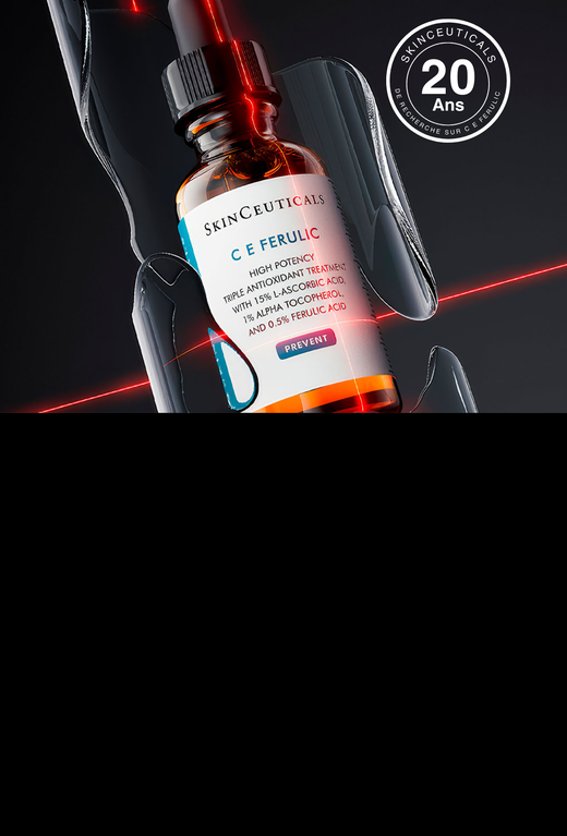Flacon de serum Skinceuticals C E Ferulic avec un fond sombre et un logo celebrant son 20e anniversaire.